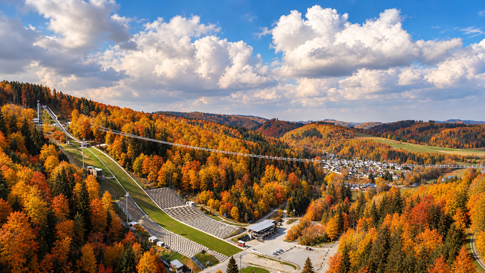 The Mühlenkopf ski jump and Skywalk footbridge on a sunny autumn day